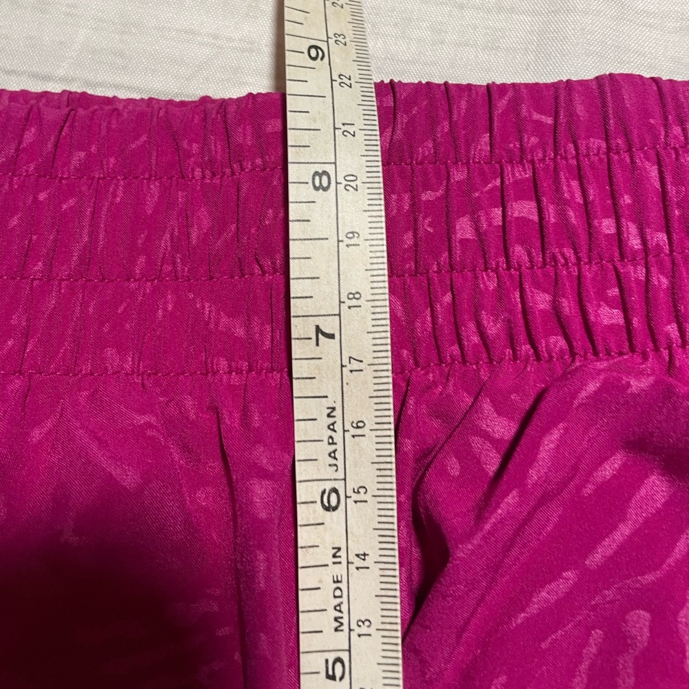 Athleta Mesh Racer Run Mid Rise 4" Shorts. Purple. Size S. - Picture 12 of 13